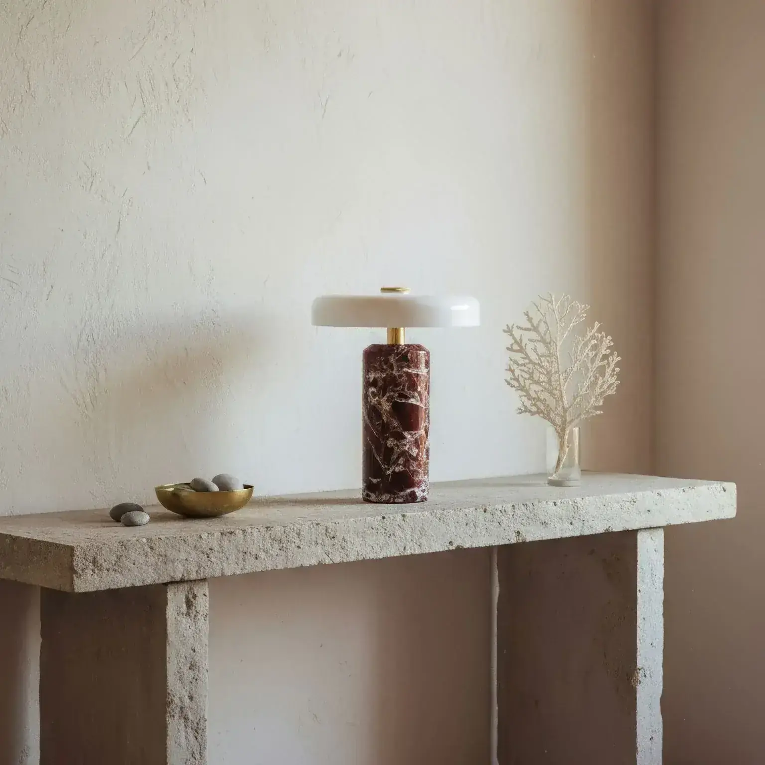 Delos lamp on a travertine console