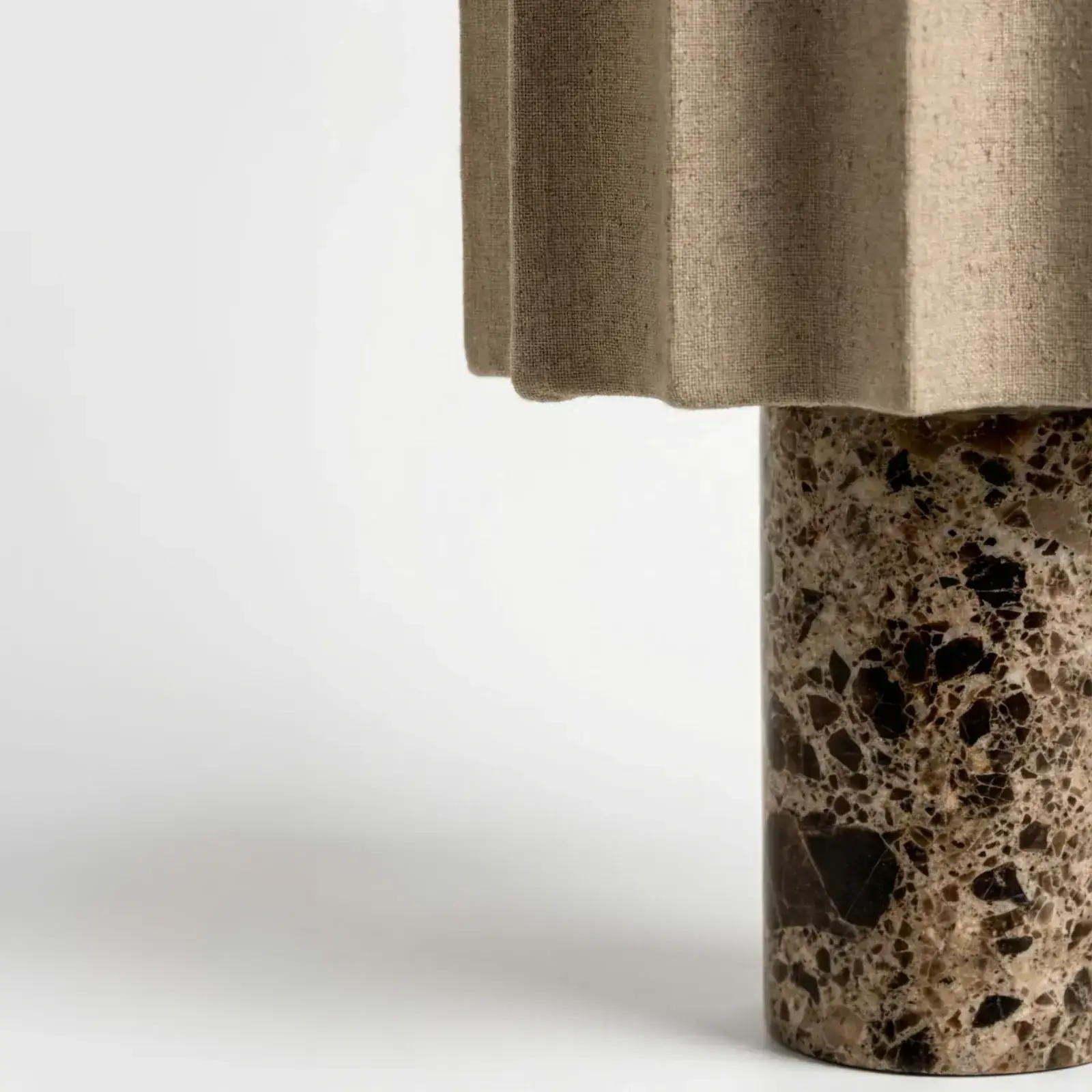 Petra Kastano marble base close-up detail