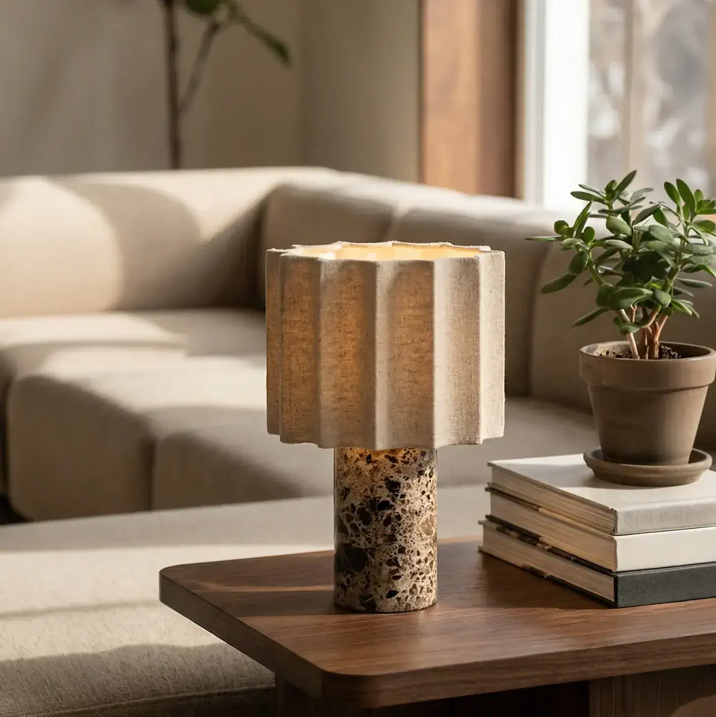 Petra Ivory Coast lamp on a poolside table